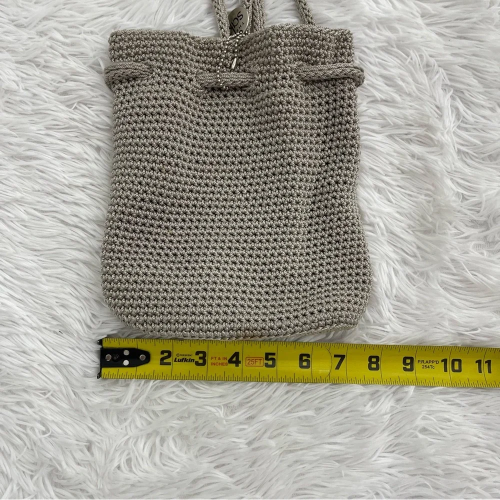 THE SAK MINI BACKPACK, GRAY/TAN COLOR. WOVEN